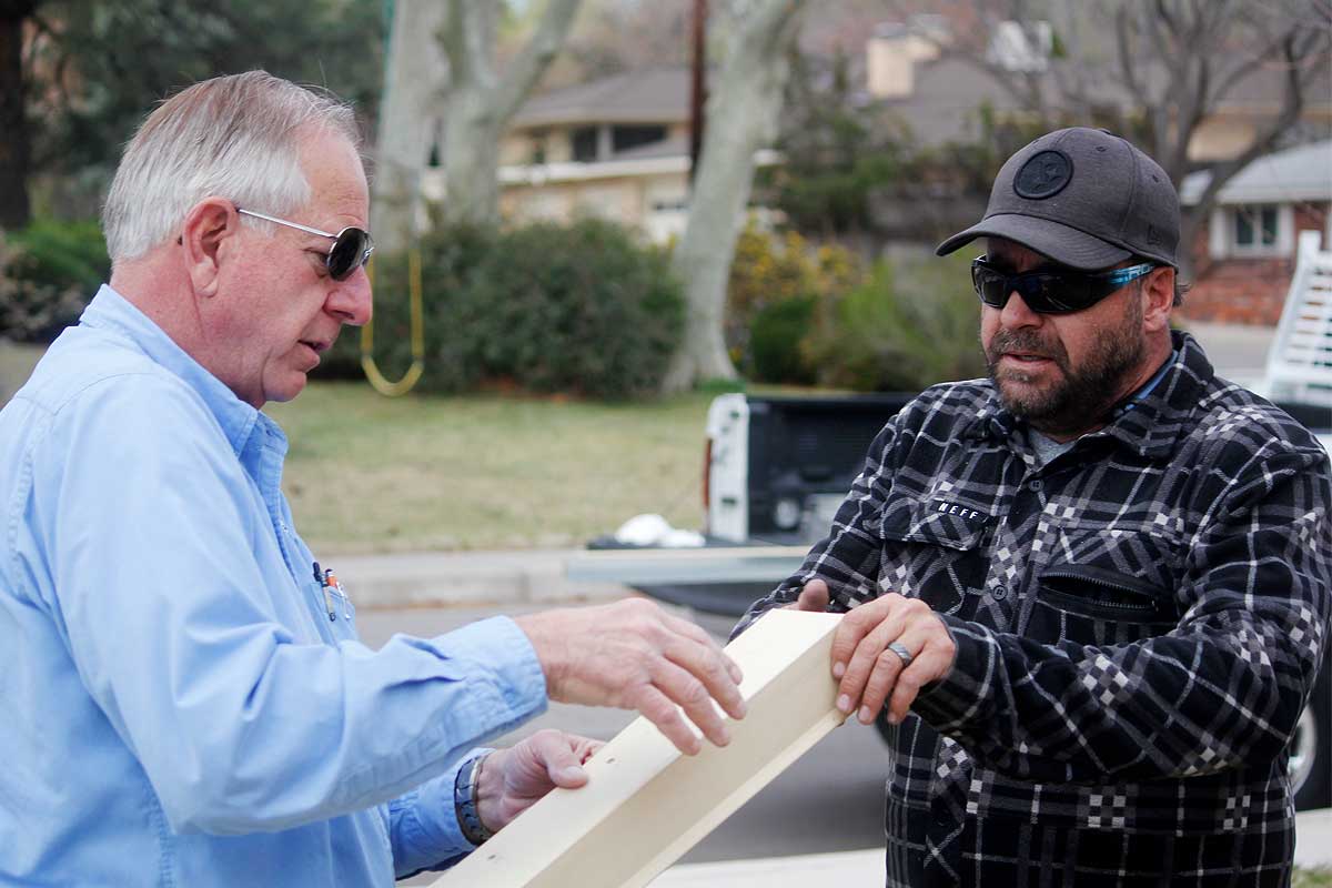 Doyle employee work on a roof