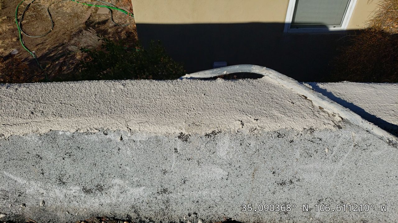 hail damage to parapet wall